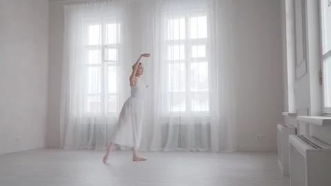 Ballerina gracefully dancing on tiptoe. pointe dancer dancing classical ballet Stock Footage 121756729