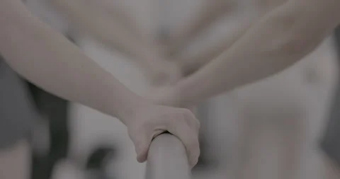 Ballerina hands on bar in motion Video stock 164479525