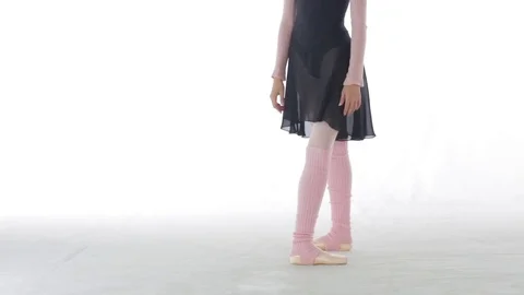 Ballerina performing pirouettes in studio Stock Footage 74596688