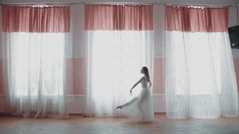 Ballerina in pointe dancing against the background Video stock 151964687