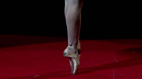 Ballerina in pointe dancing on a red circus Stock Footage 68796272