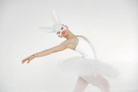 Ballerina posing in front of white background Foto stock