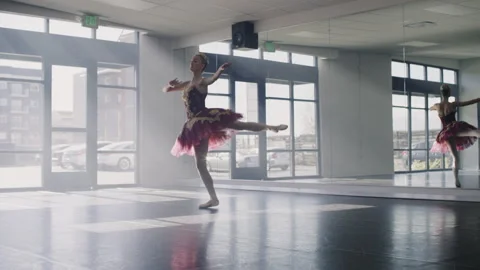 Ballerina practicing dancing en pointe in dance studio / Lehi, Utah, United Stock Footage 149062036