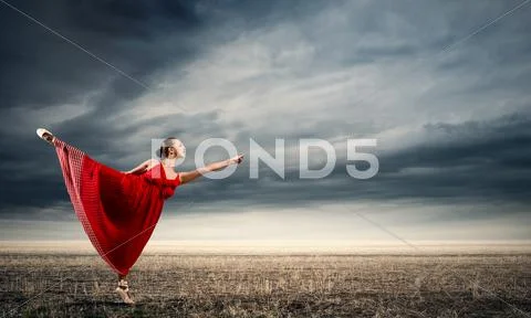 Ballerina in red dress Stock Photos