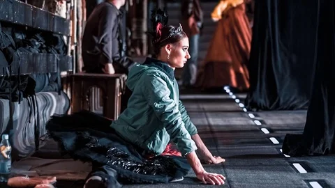Ballerina Sitting On The Warm-Up Backstage Video stock 74769718