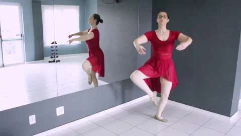 Ballerina student performing Pas de Chat in dance studio. Video stock 322851261