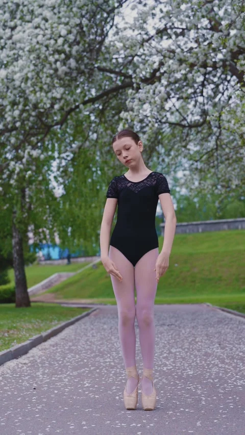 Ballerina Training in a Spring Park Stock Footage 280344457