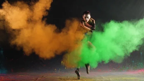 Ballet dance performance with colour powder blast slow motion action clip Stock Footage 93169123