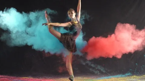 Ballet dance performance with colour powder blast slow motion action clip Stock Footage 93170619