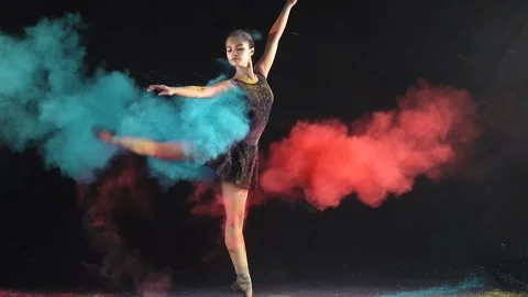 Ballet dance performance with colour powder blast slow motion action clip Stock Footage 93170734
