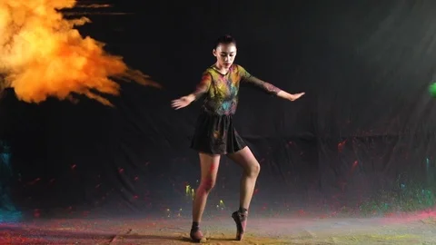 Ballet dance performance with colour powder blast slow motion action clip Stock Footage 93227172
