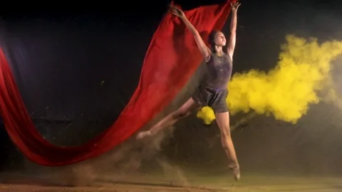 Ballet dance performance with colour powder blast slow motion action clip Stock Footage 93240324
