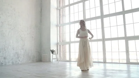 Ballet dancer dancing classical ballet. young ballerina in the bright light Video stock 88364595