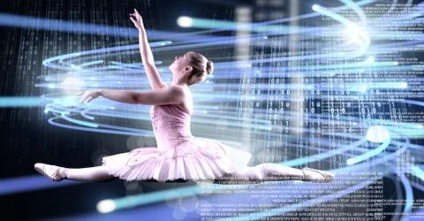 Ballet dancer dancing with digital technology interface and light glowing Stock Photos