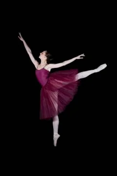 A ballet dancer doing an arabesque Stock Photos