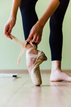 Ballet Dancer Lacing Up Stock Photos