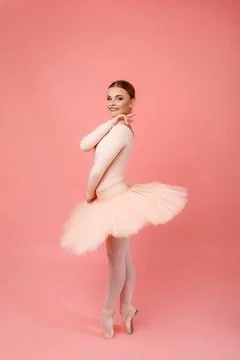 Ballet dancer over pink background Stock-Fotos