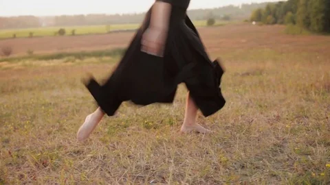 Ballet dancer posing during the sunset, silhouette concept Stock Footage 76979007