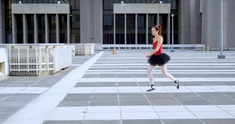 Ballet dancer practicing on pavement 4k Stock Footage 94205934