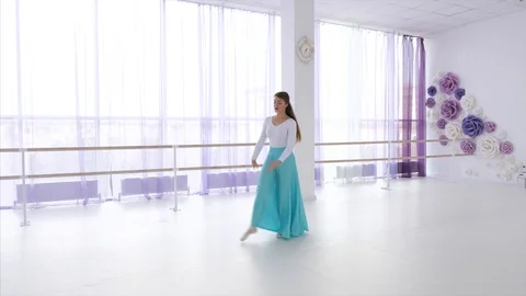 Ballet dancer is rehearsing a dancing elements. Stock Footage 122032811