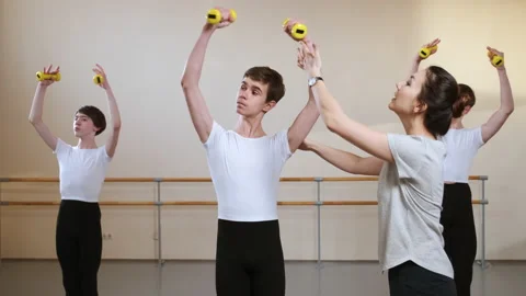 Ballet Dancing Class: Teacher Choreographer explains the Exercise Stock Footage 174119212