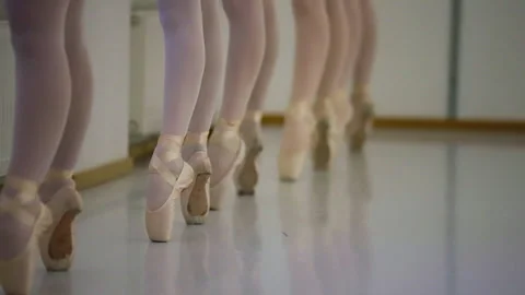 Ballet Students Practicing En Pointe in Dance Studio Class Stock Footage 336025711