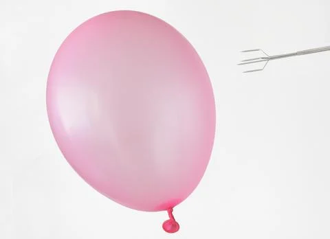 Ballon and a fork,risk,courage,problem solving and troubleshooting business Stock Photos