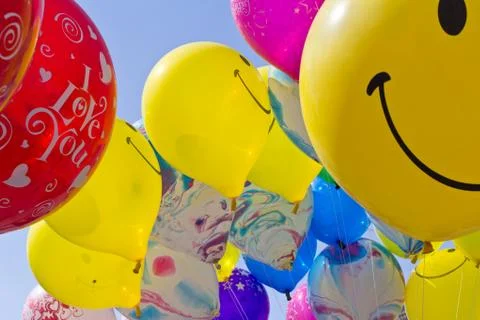 Ballons on blue sky Stock Photos