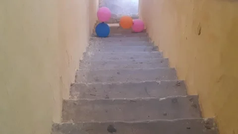 Ballons running over stairs Video stock 247167293