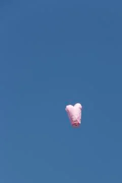The balloon flies to the clouds Stock Photos