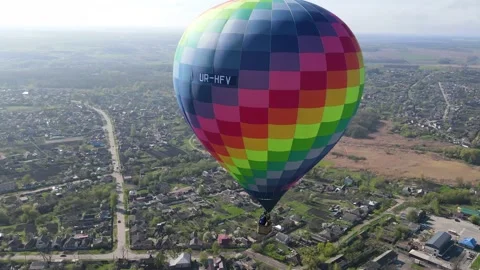The balloon flies forward and upward over the city of Valki Stock Footage 154274158