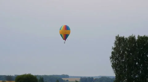 The balloon flies over a field Video stock 66552880