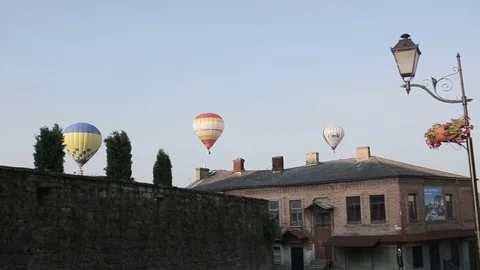 Balloon flight over old town Stock Footage 70805155