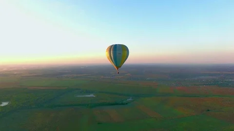Balloon in flight at sunset Stock-Footage 99509852