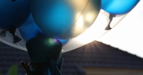 Balloon floating with beautiful sun light Stock Footage 90372132