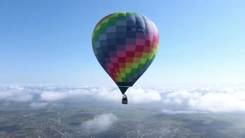 The balloon is flying above the clouds Stock Footage 154274097