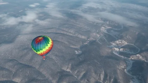 Balloon over the mountains, Bashkortostan, winter Stock Footage 102329929