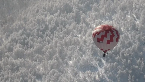 Balloon over the mountains, Bashkortostan, winter Stock Footage 102932145