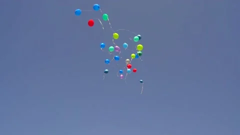Balloons being released into the sky Video stock 136048625