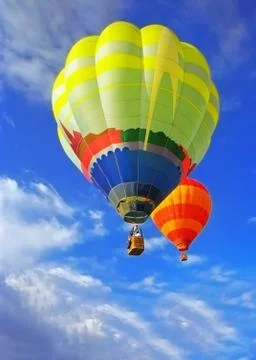 Balloons in blue sky Foto stock