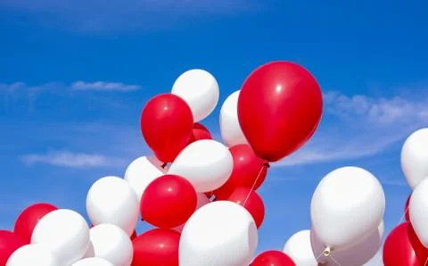 Balloons on a blue sky Stock Photos