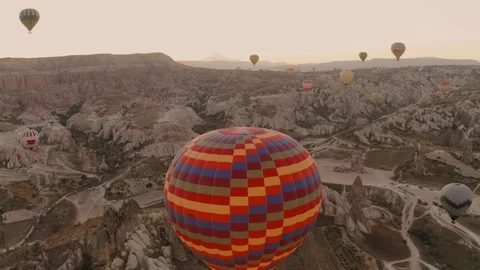 Balloons in Cappadocia. Chasing a ball on a drone. Goreme Stock Footage 120194611