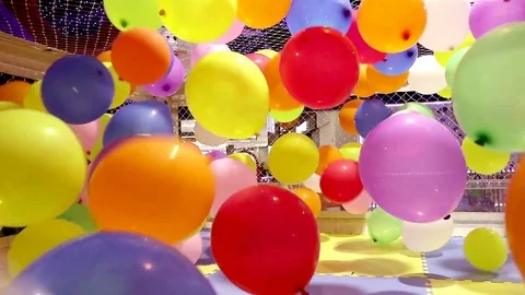 Balloons fly in confined space. Stock Footage 76384105
