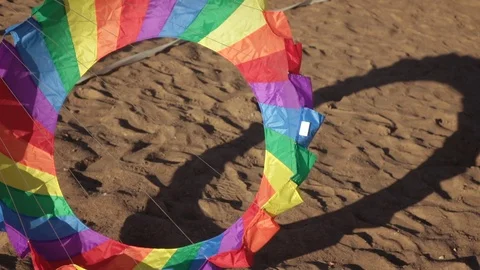 Balloons fly over the sand 스톡 동영상 72123714
