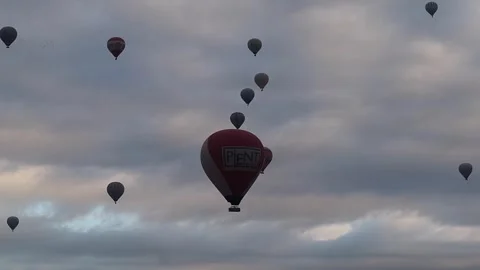Balloons fly over the sky at Goreme Cappadocia, Turkey. Video stock 245281185