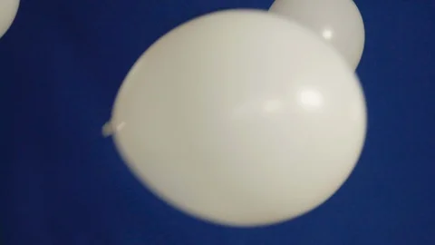 Balloons flying with in blue background Video stock 128099070