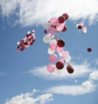 Balloons flying Stock Photos