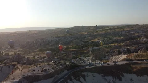 Balloons flying in the sky of Cappadocia - drone flight video Stock Footage 164720974