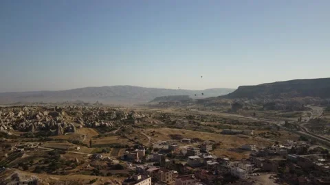 Balloons flying in the sky of Cappadocia - drone flight video Stock Footage 164727775