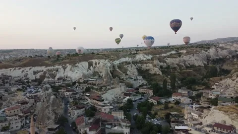 Balloons flying in the sky of Cappadocia - drone flight video 動画素材 165334652